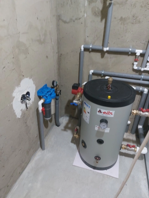 Instalare sistema de apeduct, canalizare, obiecte sanitare și încălzire cu pompă de căldură